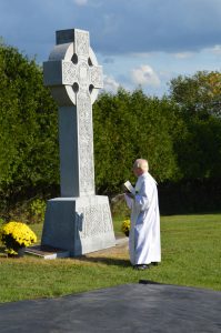 FR. MCCORMICK blessed the Celtic cross along with the triple cenotaph during the ceremony.