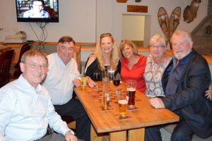 LARRY BRADLEY (far right) of the Heart and Crown Irish Pubs in Ottawa with his guests. Larry sponsored the reception at Brennan's Hill Inn.